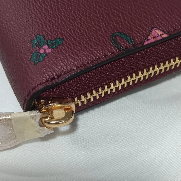 Coach Burgundy Wristlet with Floral Accents - Picture 4 of 7